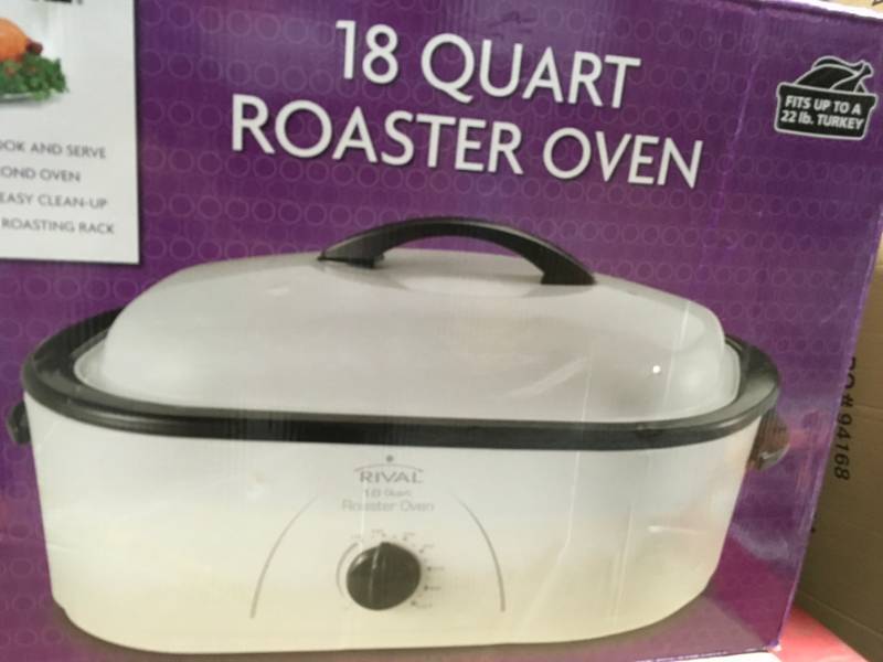 lot 64 image: Rival 18 Qt. Roaster Oven open box in like new condition