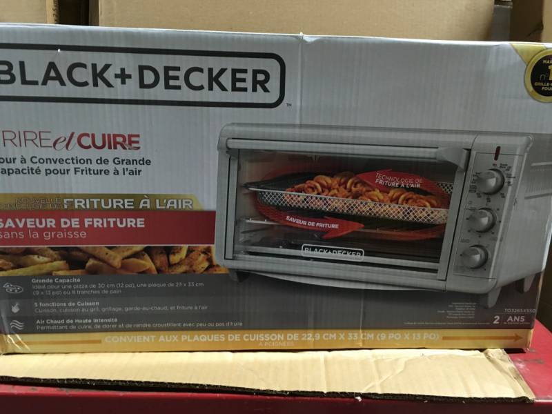 lot 65 image: BLACKDECKER Extra Wide Crisp N Bake Air Fry 8 Slice Stainless Steel Toaster Oven open box in like new condition