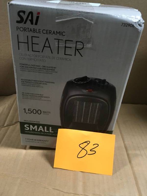 lot 83 image: 1,500-Watt Convection Electric Portable Heater and Fan open box in like new condition