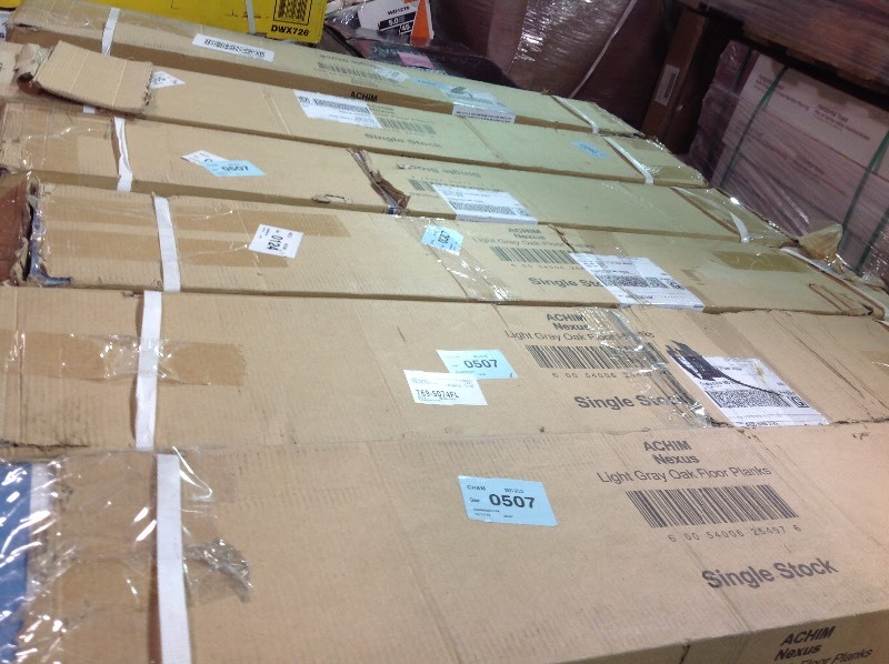 lot 105 image: Achim  Nexus Light Grey Oak 6 in. x 36 in. Vinyl Plank Flooring (15 sq. ft.case)  7 cases not used