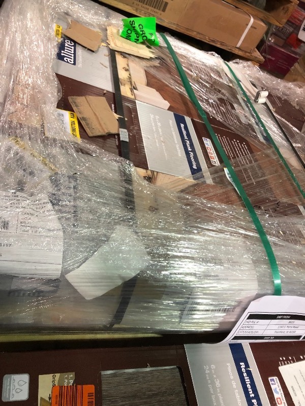 lot 112 image: TrafficMASTER  Brushed Oak Taupe 6 in. x 36 in. Luxury Vinyl Plank Flooring (24 sq. ft.  case) 5 cases not used