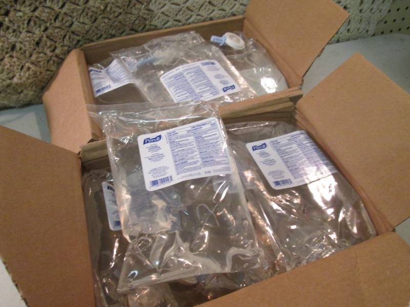2 Cases with 4 each of GoJo Purell ...