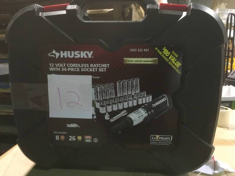 Husky 12-Volt Lithium-Ion 38 in. Drive Cordless Ratchet W 34 Piece Socket Set, Battery, Charger, and Carrying Case  in like new condition