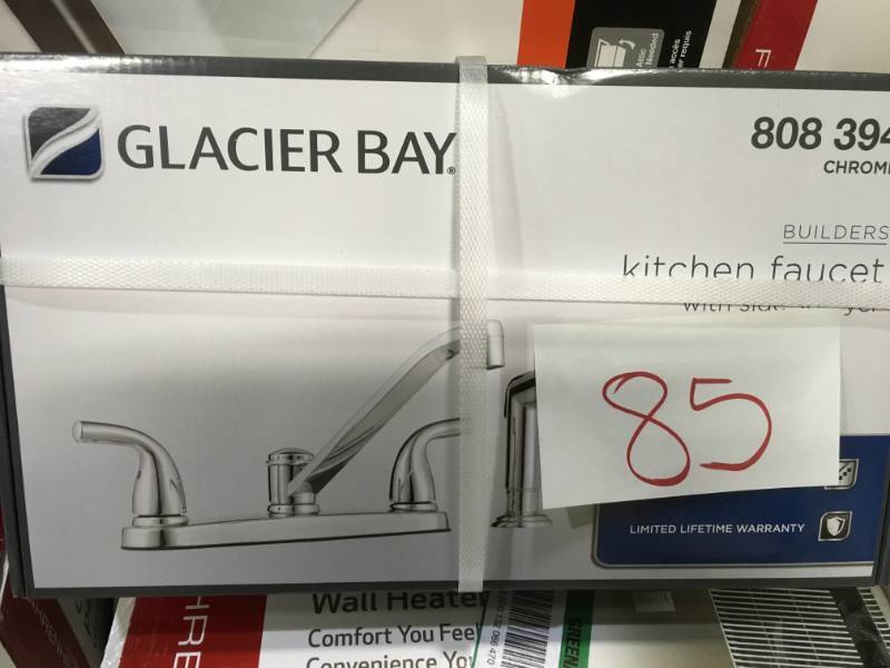 Glacier Bay Builders 2-Handle Standard Kitchen Faucet with Side Sprayer and Deck Plate in Chrome  in like new condition