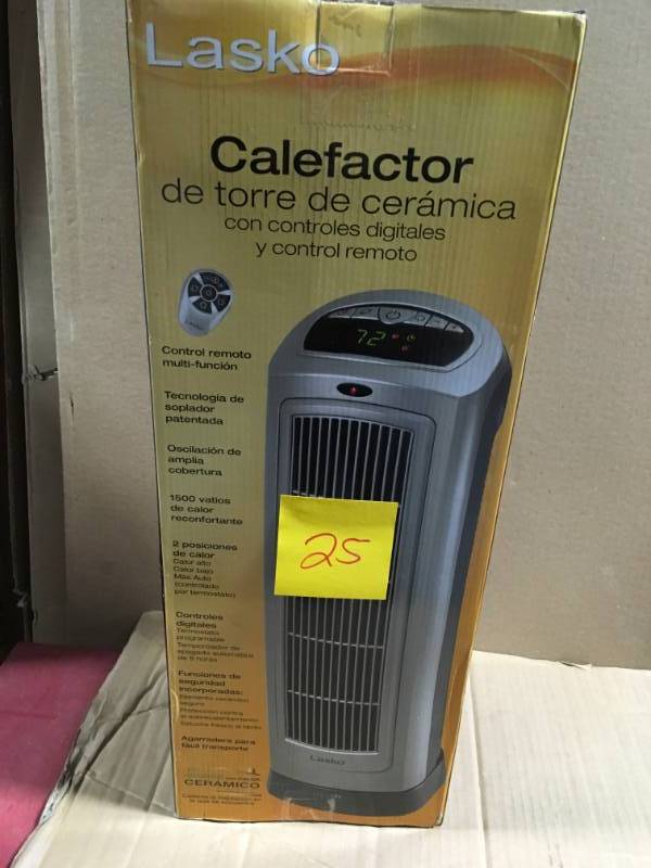 lot 25 image: Lasko 23 in. 1500-Watt Ceramic Tower Heater with Digital Display in like new condition