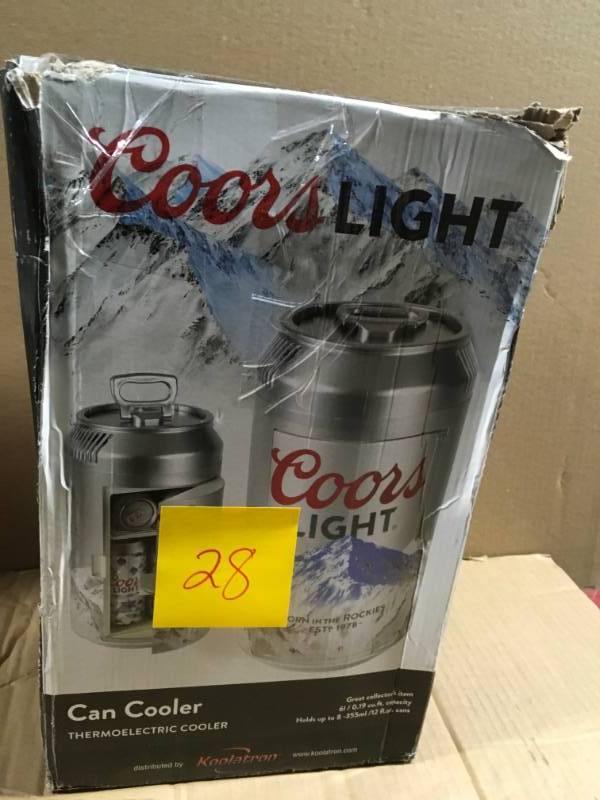 lot 28 image: Coors Light 0.65 cu. ft. Coors Light Mini Refrigerator in Silver in like new condition