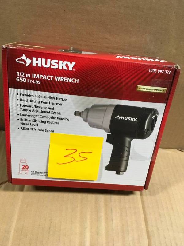 lot 35 image: Husky 650 ft.lbs. 12 in. Impact Wrench in like new condition