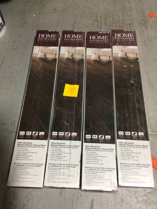 lot 39 image: Home Decorators Collection Wire Brushed Strand Woven Cocoa Bean 38 in. T x 5-15 in. W x 36.02 in. L Engineered Click Bamboo Flooring QTY 4 in like new condition