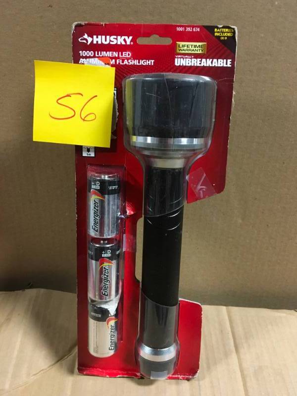 lot 56 image: Husky 1000 Lumen Virtually Unbreakable Aluminum Flashlight in like new condition