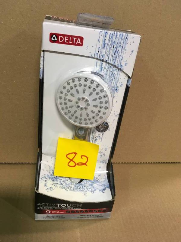 lot 82 image: Delta ActivTouch 9-Spray Handheld Showerhead with Pause in White and Chrome in like new condition