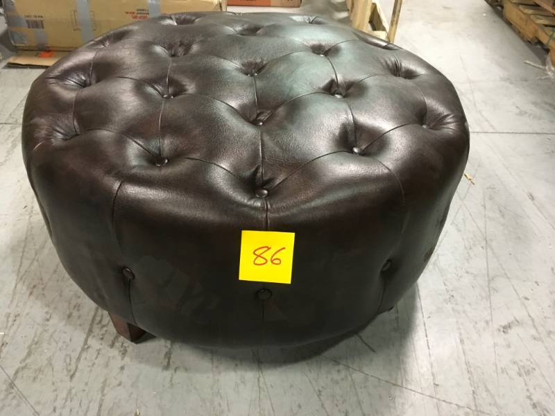 lot 86 image: Home Decorators Collection Farrow Brown Accent Ottoman in like new condition