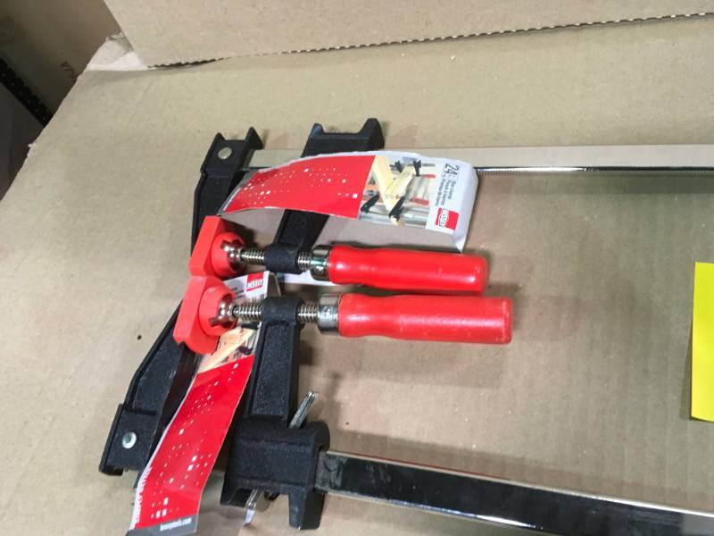 lot 89 image: BESSEY 24 in. Clutch Style Bar Clamp with Wood Handle and 2-12 in. Throat Depth in like new condition
