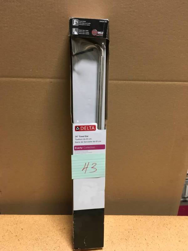 lot 43 image: Delta Everly 24 in. Towel Bar in SpotShield Brushed Nickel in like new condition