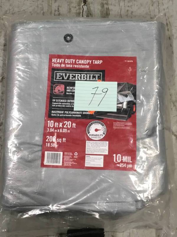lot 79 image: Everbilt 10 ft. x 20 ft. Heavy-Duty Canopy Tarp in like new condition