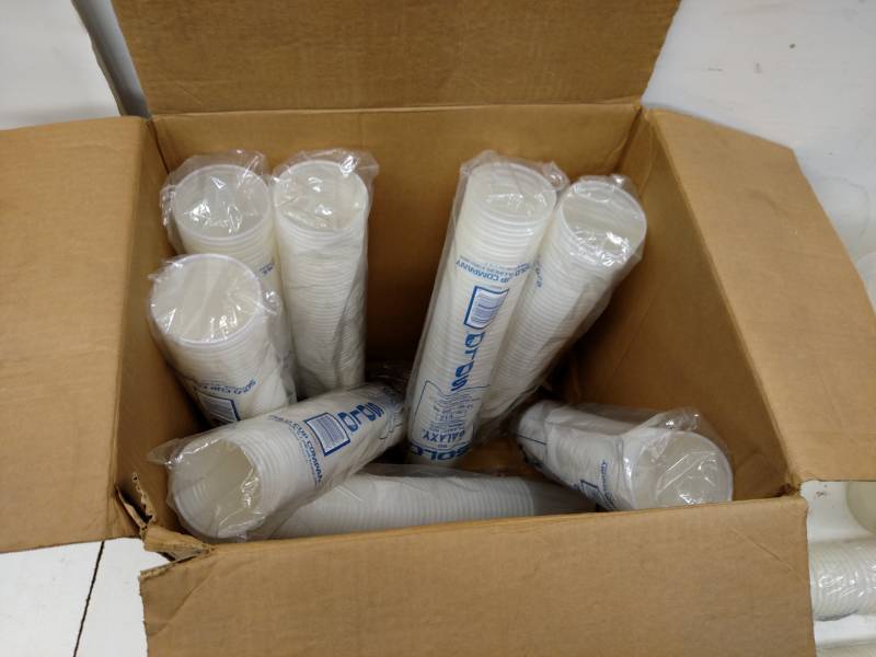lot 49 image: Asstd Pitchers, Cups, & Knee Pads...