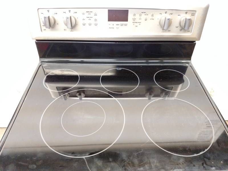 lot 61 image: Maytag Smooth Top Double Oven Range...
