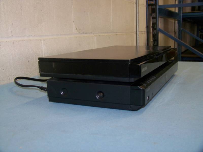 lot 58 image: (1) Sharp and (1) Samsung, Blu-Ray Disc Players