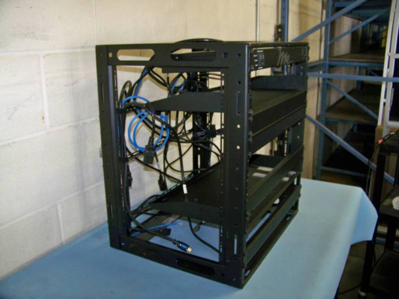 lot 56 image: Middle Atlantic, Medium-Sized, Metal, Audio  Video Equipment  Component Rack with (2) Shelves and mounted Middle Atlantic Power Center  Strip