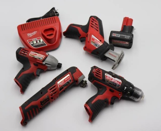lot 2 image: Milwaukee 12V DrillImpactSawzallMulti-Tool Battery & Charger
