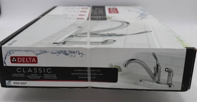 lot 31 image: Delta Classic 300-DST Single Handle Kitchen Faucet w Spray Arm