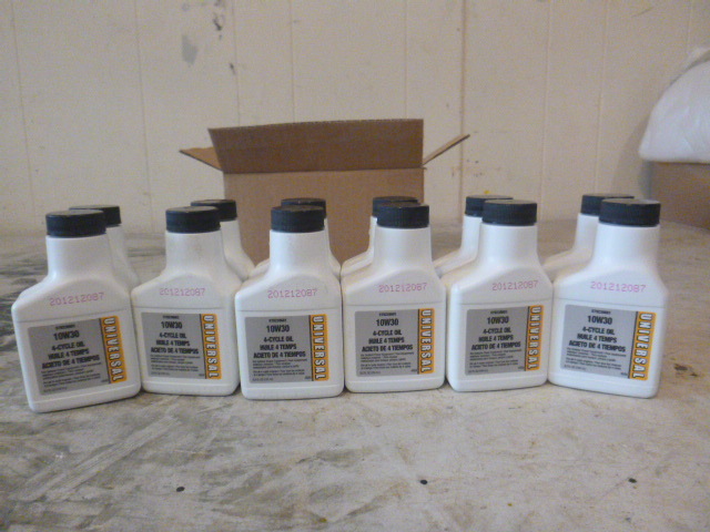12 bottles of Universal 10W30 4-Cycle Oil