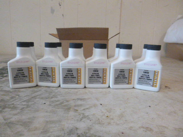 12 bottles of Universal 10W30 4-Cycle Oil