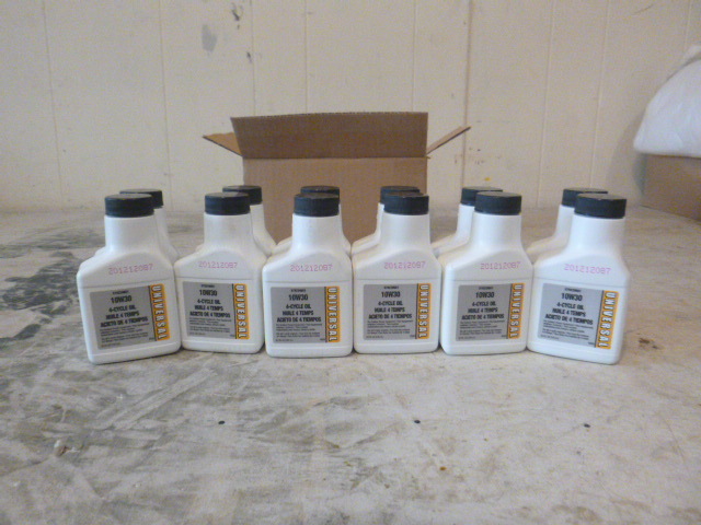 12 bottles of Universal 10W30 4-Cycle Oil