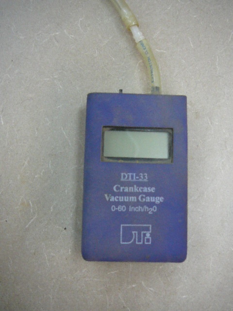 lot 109 image: Crankcase Vacuum Gauge