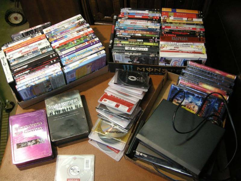 lot 41 image: 100 DVDs and 2 players