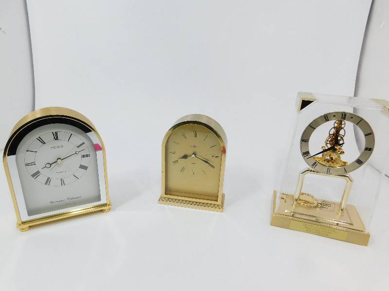 lot 6 image: Three Quartz Battery Operated Clocks