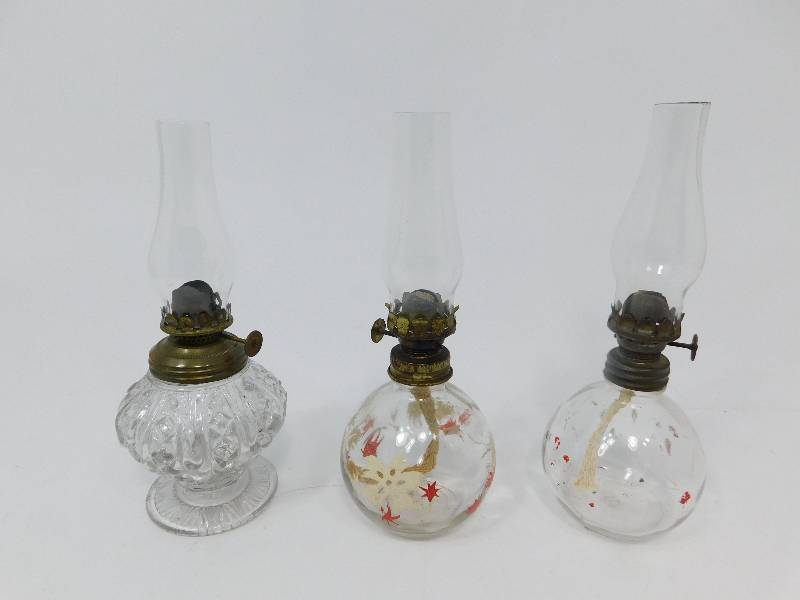 lot 83 image: Three Glass Oil Lamps With Wicks & Chimneys