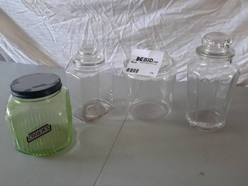 lot 74 image: 4 Glass Containers with tops