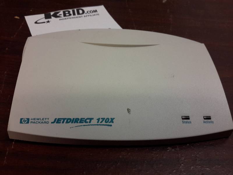lot 556 image: HP JetDirect 170X External Print Server