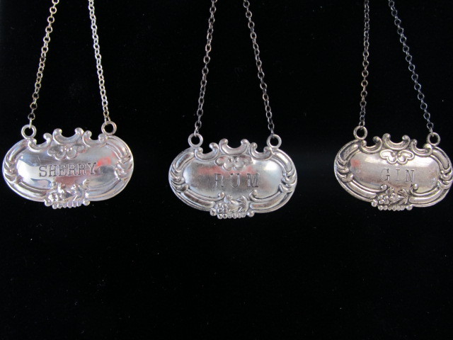 lot 92 image: 3 Vintage Signed WALLACE Sterling Silver Liquor Bottle Decanter Tags