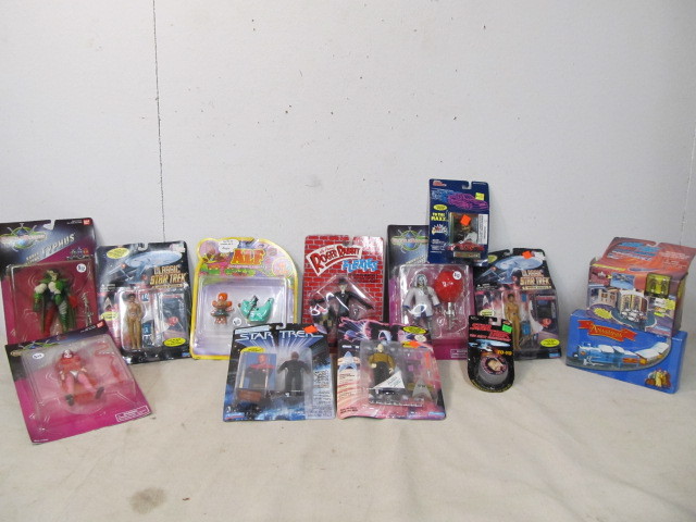 lot 165 image: Group of NIB Action Figures Toys etc