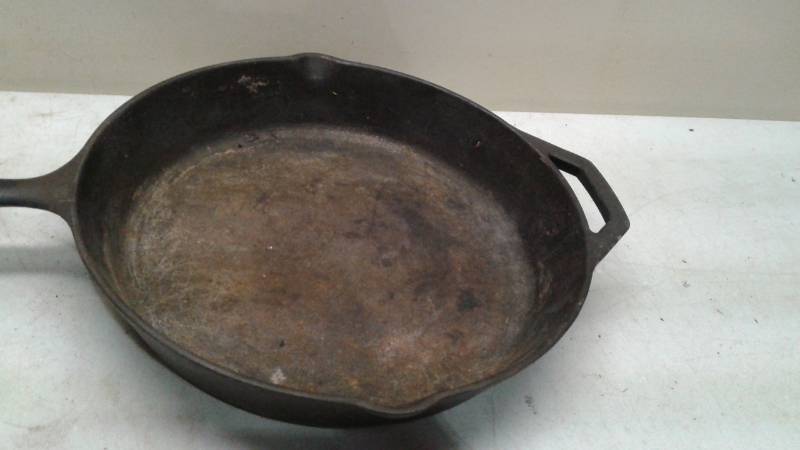 lot 34 image: Large Cast Iron Pan, Used, Shows Wear