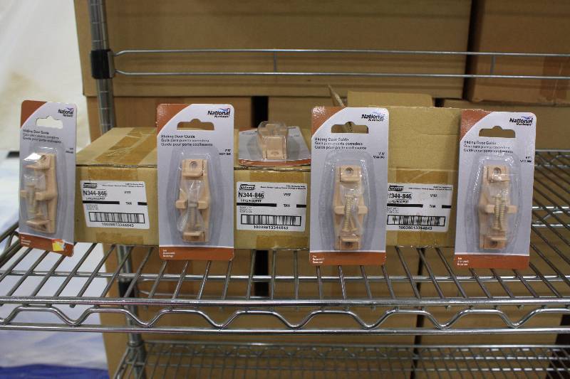 lot 85 image: National Hardware N344-846 V197 Sliding Door Guide in Tan  New 15 QTY $30 Value