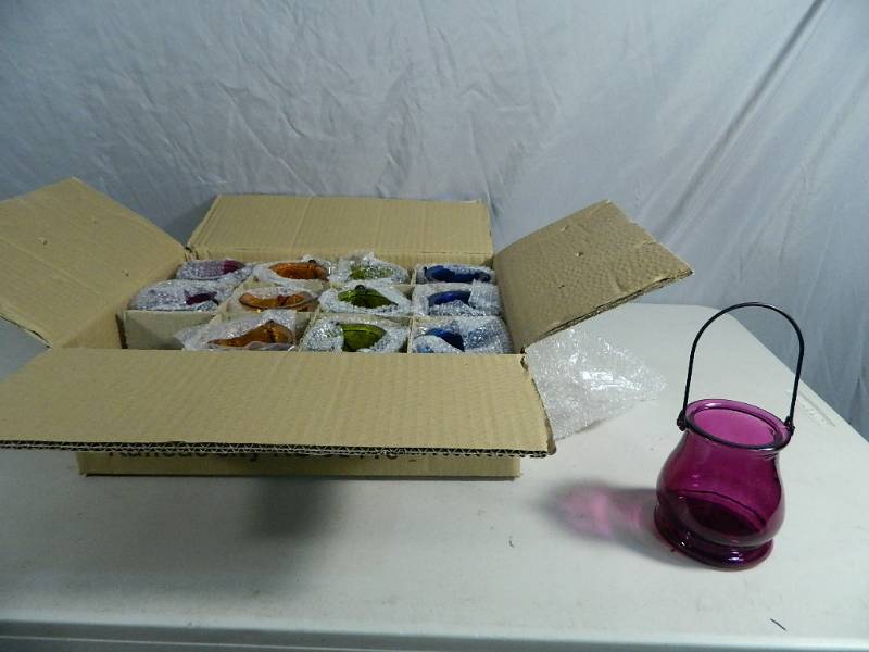 lot 39 image: Case of New Glass Candle Lanterns