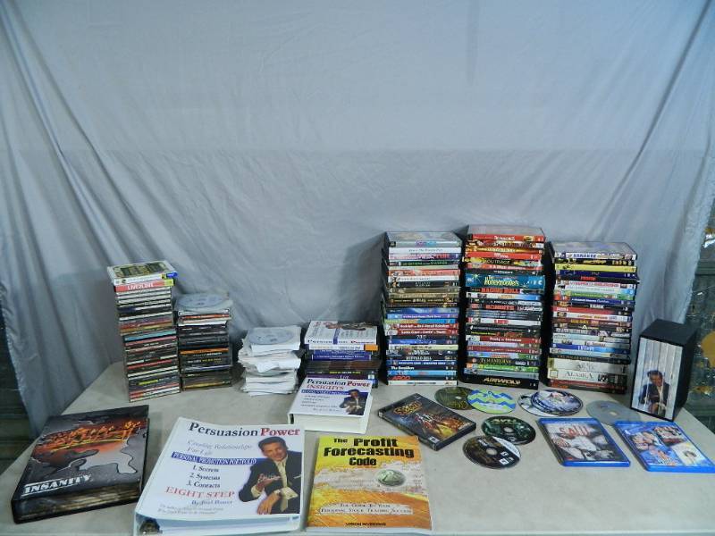 lot 107 image: DVDs, CDs, and More