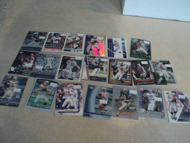 lot 4 image: Peyton Manning Cards...