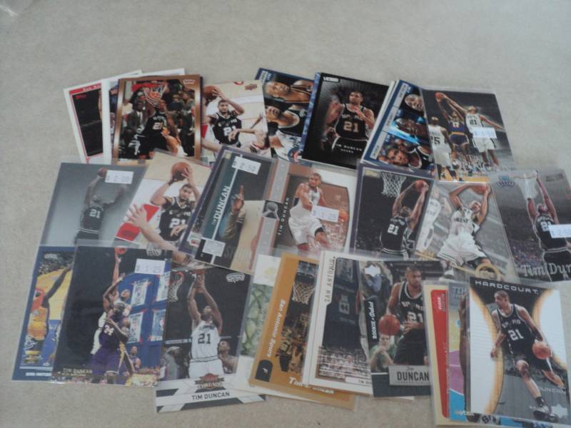 lot 34 image: 40 Tim Duncan Cards...