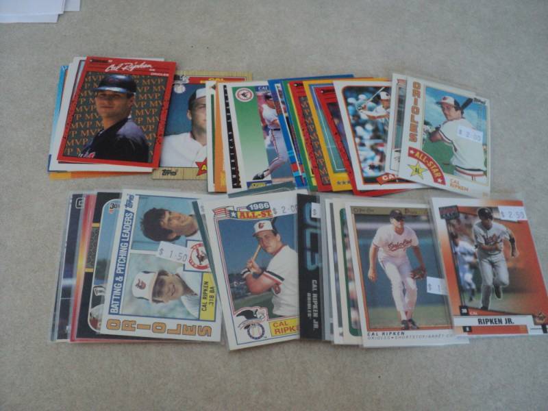 lot 78 image: 40 Cal Ripken JR Cards...