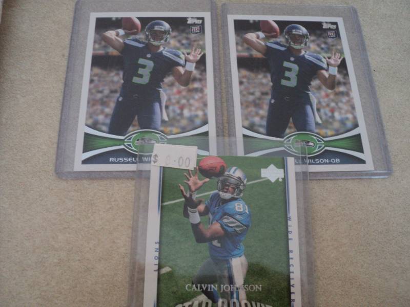 lot 101 image: Russell Wilson and Calvin Johnson R...