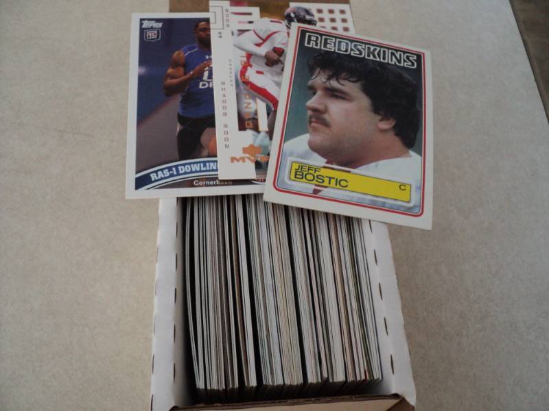 lot 113 image: 100 football Rookie Cards...