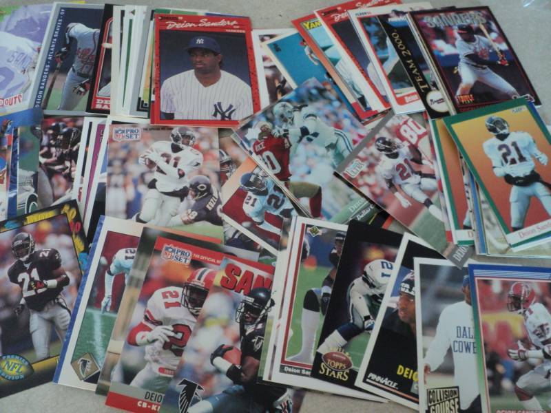 lot 117 image: 100 Deion Sanders Cards...