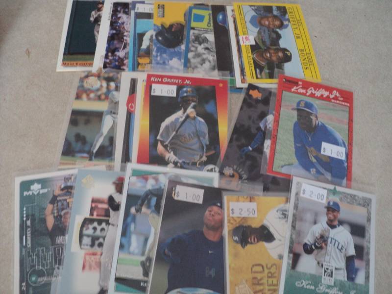 lot 120 image: 25 Ken Griffey JR Cards...
