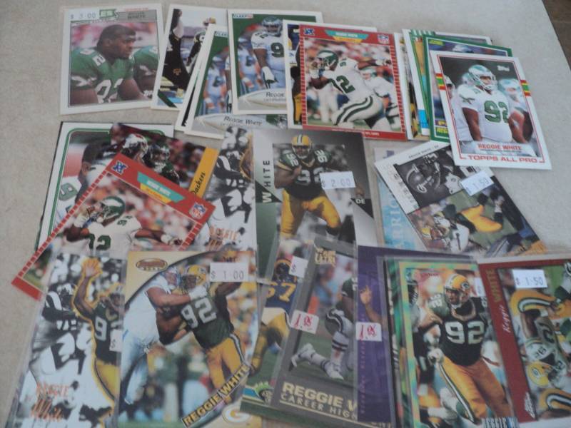 lot 124 image: 40 Reggie White Cards...