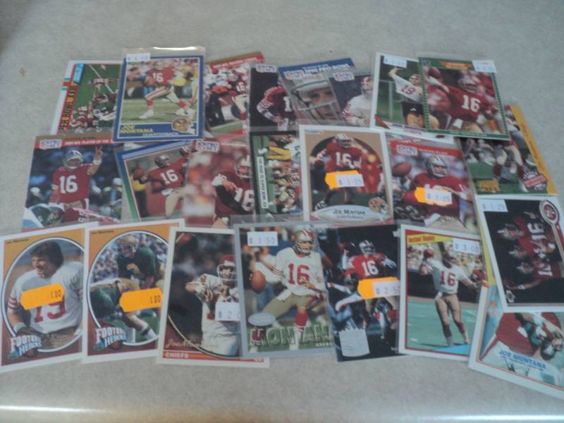 lot 129 image: 25 Joe Montana Cards...