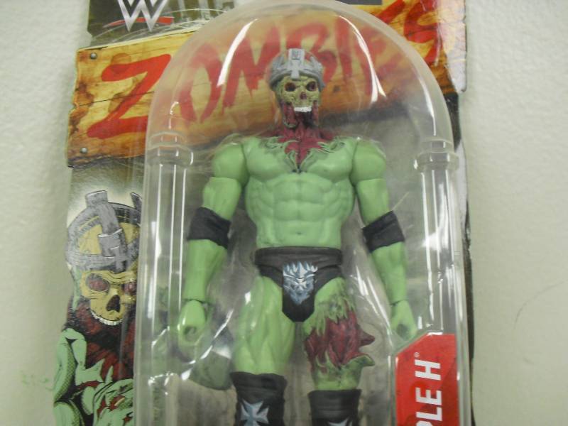 lot 12 image: Triple H Zombie Wrestling Action Figure