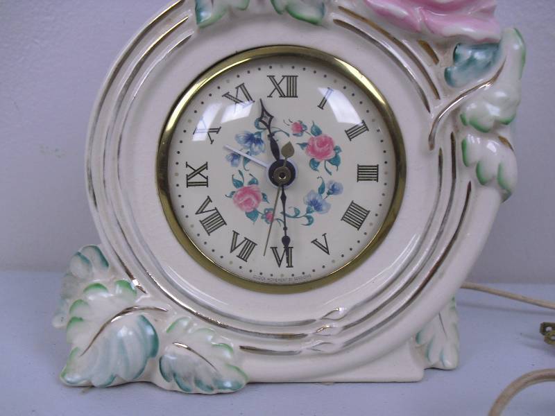 lot 23 image: Vintage Johnson-Sessions Porcelain Mantel Clock